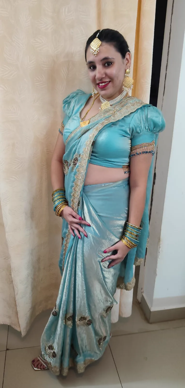 Aqua Tissue Saree with Pearl Latkan